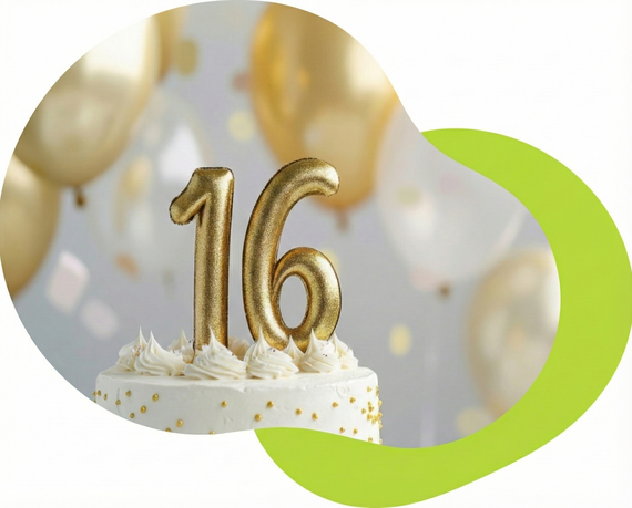 A white birthday cake adorned with golden '16' candles, set against a backdrop of gold and white balloons.